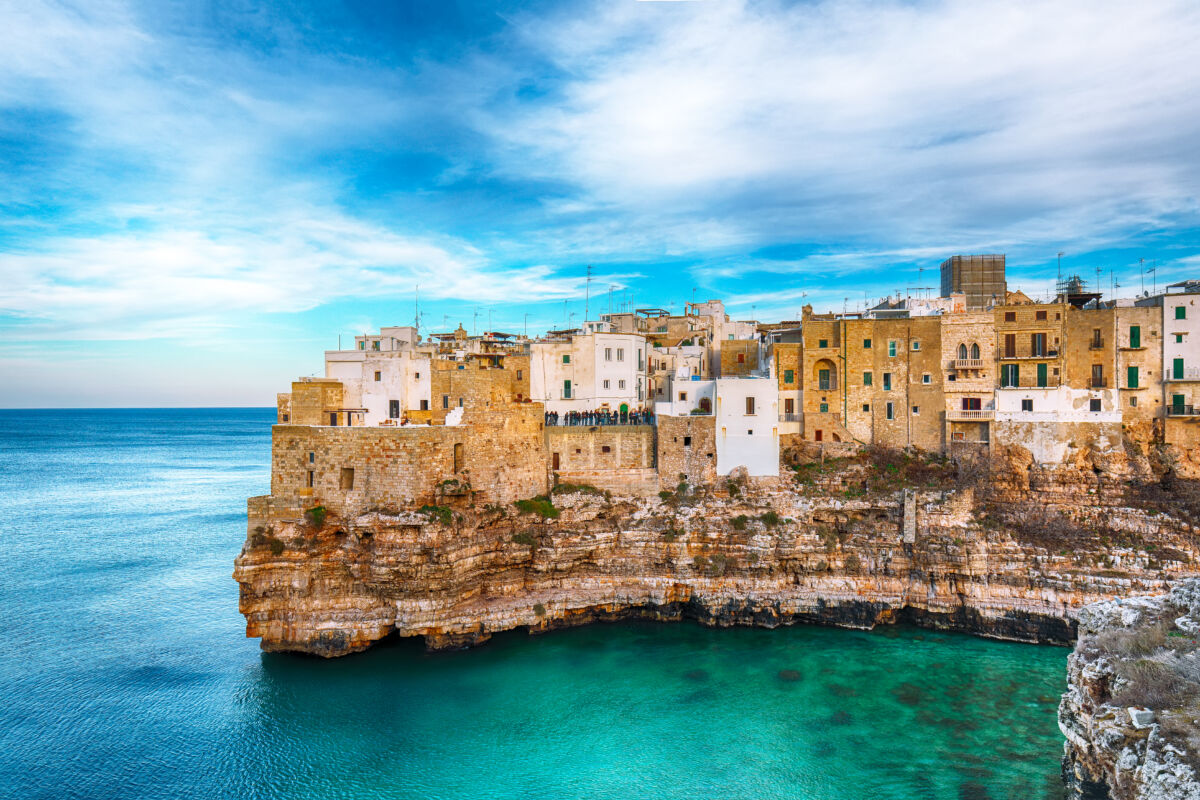 Polignano,A,Mare,Village,On,The,Rocks,At,Sunset.,Polignano